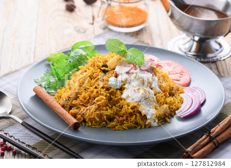 Indian food Chicken Biryani and Raita (Indian style yogurt salad) Indian food Chicken Biryani and Raita (Indian style yogurt salad) 127812984