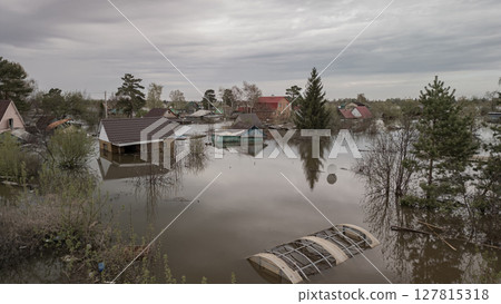Global warming, floods on the planet.The apocalypse, catastrophes.Storms and destruction.Natural disasters,climate change,the riot of nature.The remnants of human life are floating in dirty water.End 127815318