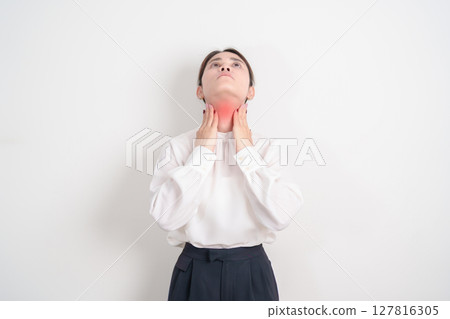 business Woman checking Thyroid gland disease. Hand holding Neck pain and Sore Throat. Hyperthyroidism, Hypothyroidism, Hashimoto Thyroiditis, Thyroid Tumor and Cancer, Postpartum, Papillary Carcinoma 127816305