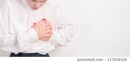 Business Woman having chest pain for Heart disease, angina disease and symptom heart attack disease Cardiovascular, Atherosclerosis, Hypertensive, Breast Cancer awareness, world Heart day and Health 127816326