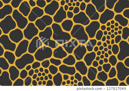 Seamless python skin pattern with large irregular black scales on orange background 127817049