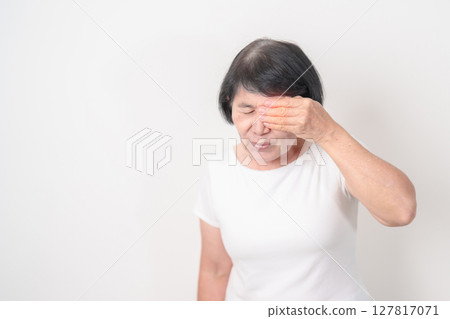 Elderly Woman having Eye pain and Irritation for concepts of Eye disease, Cataract, Glaucoma, Age Related Macular Degeneration, Diabetic Retinopathy, dry eyes, Conjunctivitis, World Glaucoma day Elderly Woman having Eye pain and Irritation for concepts of Eye disease, Cataract, Glaucoma, Age Related Macular Degeneration, Diabetic Retinopathy, dry eyes, Conjunctivitis, World Glaucoma day 127817071