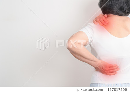 Elderly woman having back body ache for concepts of Back Muscle Strain, Piriformis Syndrome, Low Back Pain, Lumbar Disc Degeneration, Herniated, Osteoporosis, Spinal Compression and Health care 127817206