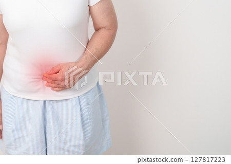 Elderly woman having Colon pain for Colonic disease, Inflammatory Bowel, IBD, Colorectal cancer, Ulcerative colitis, Diverticulitis, Irritable bowel syndrome, Digestive system and Health concept Elderly woman having Colon pain for Colonic disease, Inflammatory Bowel, IBD, Colorectal cancer, Ulcerative colitis, Diverticulitis, Irritable bowel syndrome, Digestive system and Health concept 127817223