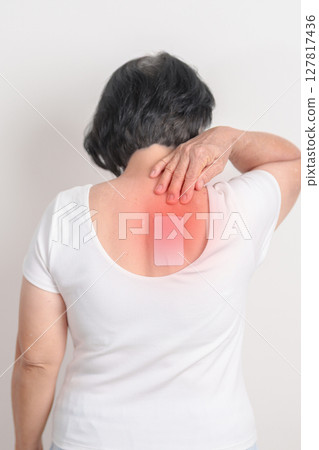 Business woman having back ache with Medicated pain relief patch plaster for Back Muscle Strain, Scapular Muscle Tightness, Piriformis Syndrome, Osteoporosis, Spinal Compression and Health care Business woman having back ache with Medicated pain relief patch plaster for Back Muscle Strain, Scapular Muscle Tightness, Piriformis Syndrome, Osteoporosis, Spinal Compression and Health care 127817436