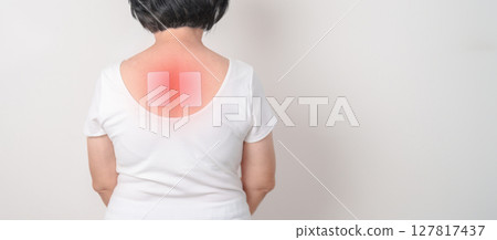Business woman having back ache with Medicated pain relief patch plaster for Back Muscle Strain, Scapular Muscle Tightness, Piriformis Syndrome, Osteoporosis, Spinal Compression and Health care Business woman having back ache with Medicated pain relief patch plaster for Back Muscle Strain, Scapular Muscle Tightness, Piriformis Syndrome, Osteoporosis, Spinal Compression and Health care 127817437