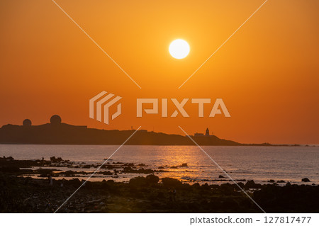 Sunset Over Shimen Coastline and Fuguijiao Lighthouse New Taipei City Taiwan. Sunset Over Shimen Coastline and Fuguijiao Lighthouse New Taipei City Taiwan. 127817477