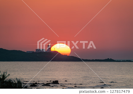 Sunset Over Shimen Coastline and Fuguijiao Lighthouse New Taipei City Taiwan. Sunset Over Shimen Coastline and Fuguijiao Lighthouse New Taipei City Taiwan. 127817479