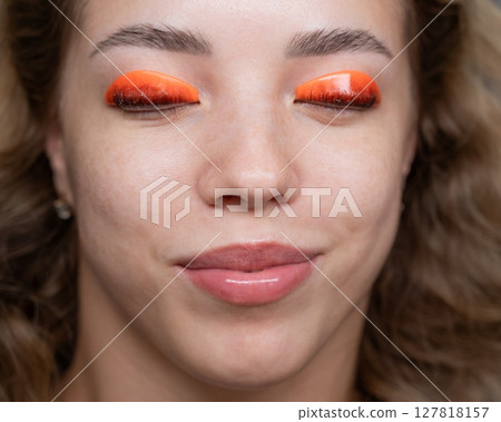 Caucasian woman undergoing eyelash lamination procedure. Top view.  127818157