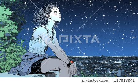Young woman gazing at the starry sky 127818841