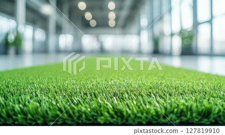 Artificial grass flooring enhances aesthetic appeal and promotes a healthier work environment in contemporary offices, seamlessly blending indoor and outdoor spaces 127819910