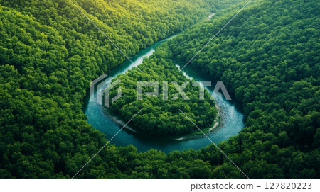 Aerial view of the beautiful krka national park in croatia, showcasing a pristine river winding its way through a dense, vibrant green forest, promoting eco tourism and sustainable travel 127820223