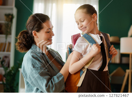 Happy family preparing for school 127821467