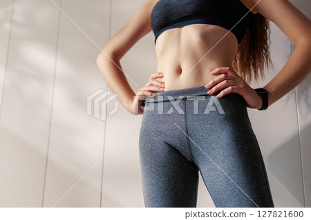 Woman in fashionable sportswear 127821600