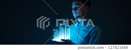 Confident businessman presents financial chart, highlighting finance, investment, technology, and data analysis 127821689