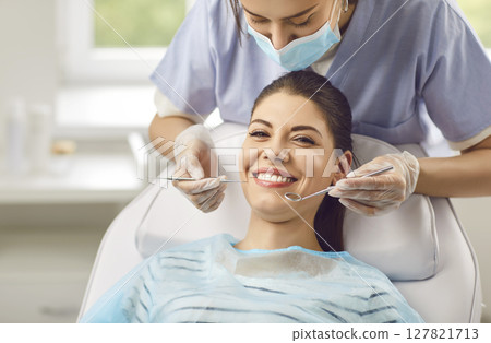 Portrait Of Woman Patient At Dentist Teeth Check Up In Clinic Portrait Of Woman Patient At Dentist Teeth Check Up In Clinic 127821713