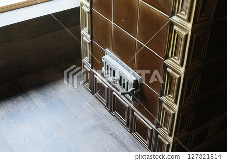 A Stylish Vent Cover Located on a Vintage Tile Wall Adds Unique Aesthetic Appeal and Character A Stylish Vent Cover Located on a Vintage Tile Wall Adds Unique Aesthetic Appeal and Character 127821814