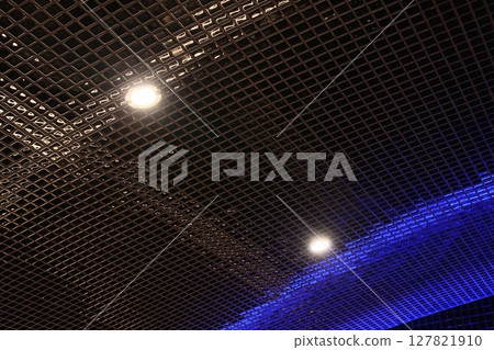 A Modern Ceiling Design that features Ambient Lighting and a stylish Grid Pattern for aesthetics 127821910