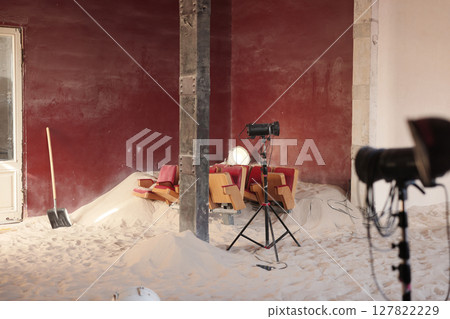 An Abandoned Studio Filled with Sand and Decorated with Vintage Furniture Elements 127822229