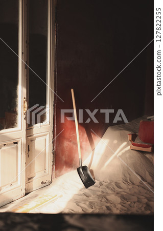 The Play of Light and Shadow in an Abandoned Room with Sand Creates a Unique Atmosphere 127822255