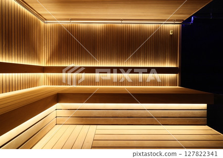 Experience a Modern Sauna Interior Featuring Soft Lighting and a Gorgeous Wooden Finish 127822341