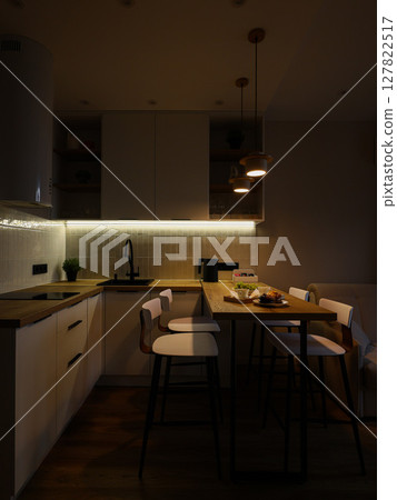 A Stylish and Modern Kitchen, Featuring Ambient Lighting and Comfortable Seating Areas 127822517