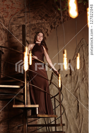 We present the concept of elegant fashion presented in a unique and stunning industrial space We present the concept of elegant fashion presented in a unique and stunning industrial space 127822848