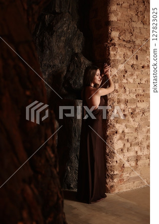 An Artistic Perspective of Serenity Within a Dimly Lit and Calm Background Setting 127823025