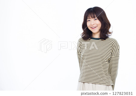 A woman wearing striped clothes A woman wearing striped clothes 127823031