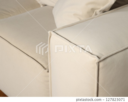 A Modern White Couch with Comfortable Cushions for Chic and Stylish Living Spaces A Modern White Couch with Comfortable Cushions for Chic and Stylish Living Spaces 127823071