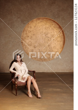 An Elegant Woman Posing Gracefully in a Modern Artistic Setting with Creative Expression An Elegant Woman Posing Gracefully in a Modern Artistic Setting with Creative Expression 127823134