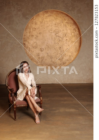 An Elegant Woman is Posing in a Beautiful Artistic Setting that Features Stellar Wall Art An Elegant Woman is Posing in a Beautiful Artistic Setting that Features Stellar Wall Art 127823153