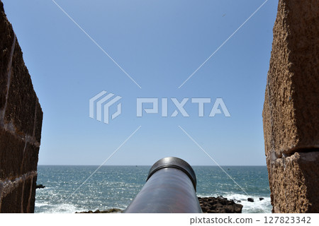 Bronze cannon, historic rampart and fortification, sea view in Essaouira, Morocco 127823342