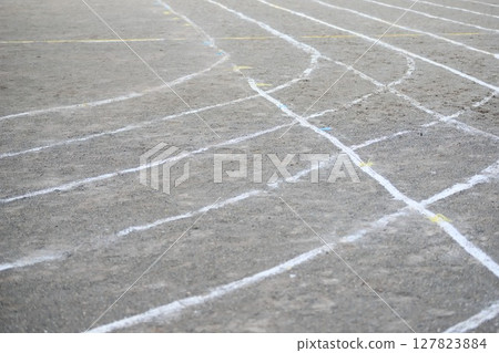 Curved white lines on the grounds at the athletic meet venue 127823884