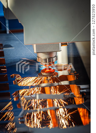 CNC Laser cutting of metal, modern industrial technology. CNC Laser cutting of metal, modern industrial technology. 127823950