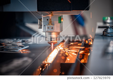 CNC Laser cutting of metal, modern industrial technology. CNC Laser cutting of metal, modern industrial technology. 127823970