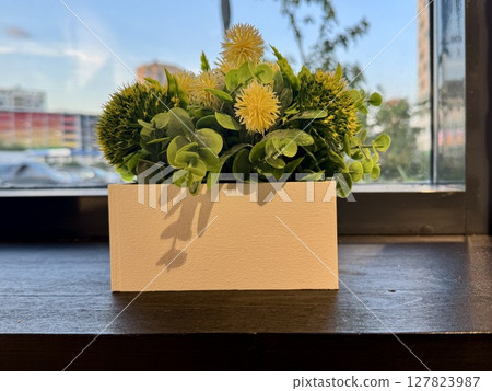 Beautiful flower arrangement in a cafe. High quality photo Beautiful flower arrangement in a cafe. High quality photo 127823987