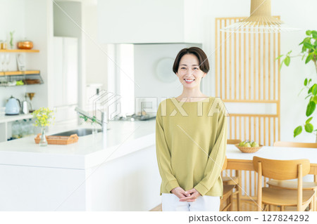 Middle-aged housewife at home Middle-aged housewife at home 127824292
