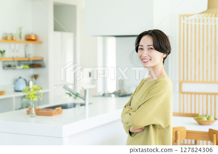 Middle-aged housewife at home Middle-aged housewife at home 127824306