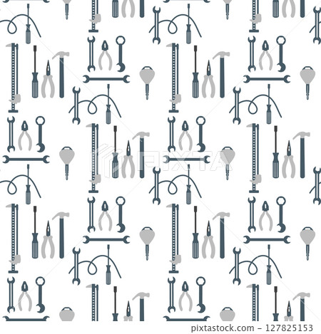 Tools pattern with screwdrivers, hammers, and wrenches in seamless background design 127825153