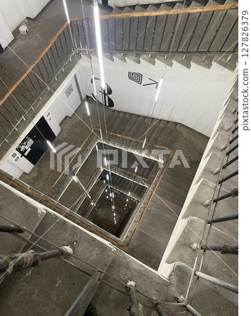 Aerial Perspective of a Staircase in an Urban Environment with Architectural Details Aerial Perspective of a Staircase in an Urban Environment with Architectural Details 127826379