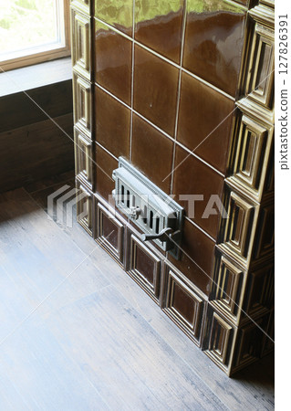 An Elegant and Stylish Brown Tile Heating Vent in Modern Interior Design Enhancing Aesthetic Charm 127826391