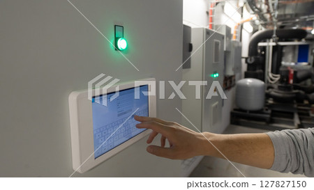 Modern Control System Interface with Green Indicator Light.  127827150