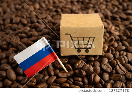 Russia flag with shopping cart box on coffee beans, shopping online for import export. Russia flag with shopping cart box on coffee beans, shopping online for import export. 127827178