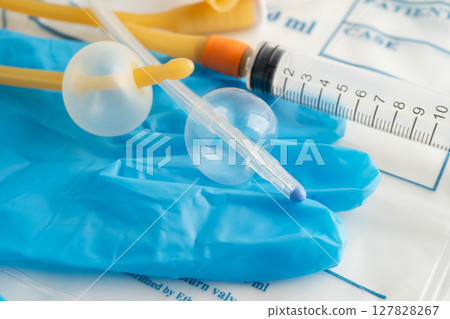 Foley catheter and urine drainage bag collect urine for disability or patient in hospital. 127828267