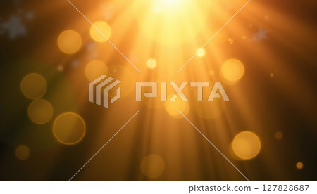 a bright orange sun setting over a field 127828687
