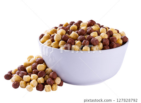 corn balls and chocolate corn balls pouring out of ceramic  bowl isolated on white background. 127828792