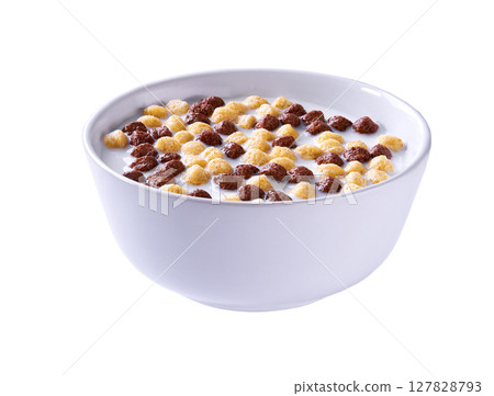 corn balls and chocolate corn balls with milk in a bowl isolated on a white background. 127828793