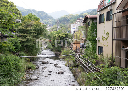 River flowing through hot spring town River flowing through hot spring town 127829201