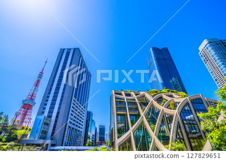 Tokyo cityscape in Japan: Towards a new era... (bustling with foreign tourists) View of Azabudai Hills and Tokyo Tower Tokyo cityscape in Japan: Towards a new era... (bustling with foreign tourists) View of Azabudai Hills and Tokyo Tower 127829651